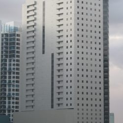 The Bonifacio One Technology Tower is the light-gray building in the foreground. It was shot from along 28 St. between 4th Avenue and 5th Ave.
