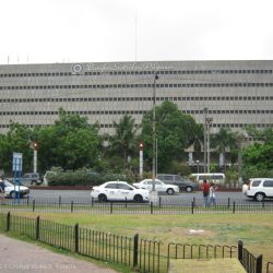 View of a Banko Sentral ng Pilipinas (Central Bank of the Philippines) building as seen from ASEAN Garden (foreground). The road between the central bank and the ASEAN Garden is Roxas Boulevard.