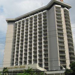 Picture of Century Park Hotel shot from the sidewalk at the front of Orchid Garden Suites, located just across Century Park Hotel.