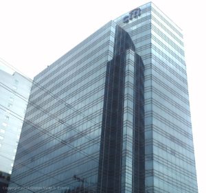 View of Citibank Square building along E. Rodriguez Jr. Avenue (C5) as seen from the opposite side of C5. Only the upper levels are seen.