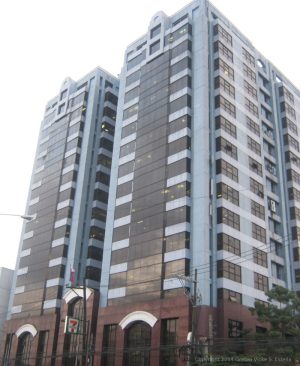 Columbia Tower as seen from the sidewalk at the corner of Ortigas Avenue and Holy Cross St. near La Salle Greenhills.