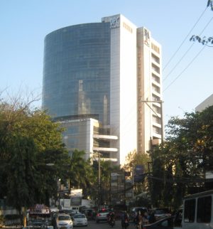 DPC Place as seen while standing in the middle of Chino Roces Ave. in front of Makati Hope Christian School.