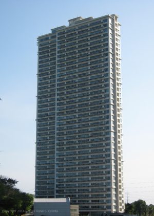Fifth Avenue Place as seen from Old Lawton Avenue near the oval road (the entrance to American Cemetery).