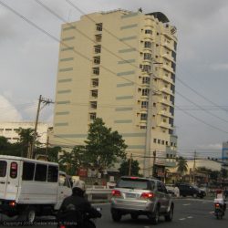 Picture of First Marcel Tower taken while walking in front of Shell Station at the opposite corner.