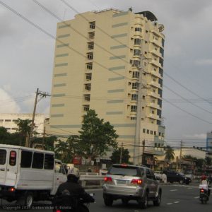 Picture of First Marcel Tower taken while walking in front of Shell Station at the opposite corner.