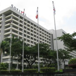 Photo of Sofitel shot from the sidewalk along Atong Dela Rama St. opposite that of the hotel.