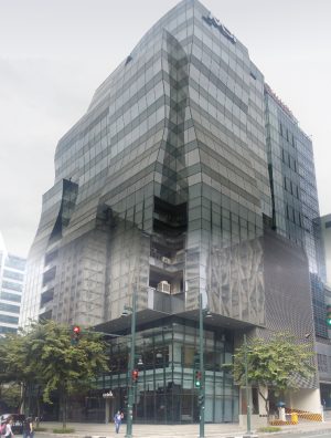 MDI Corporate Center is made of dark glass panels and wavy protrusions. The picture here was taken from the opposite corner of 10th Ave. and 39th St. with an upward-diagonal angle.
