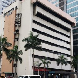 Padilla Building is building with a simple blocky appearance and light gray concrete facade.
