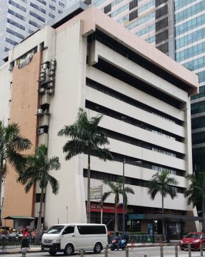 Padilla Building is building with a simple blocky appearance and light gray concrete facade.