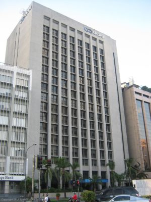 UCPB Corporate Offices is a blocky building with a facade of gray concrete. This picture was taken from Paseo De Roxas corner Makati Avenue, on the sidewalk adjacent to Zuellig Building.